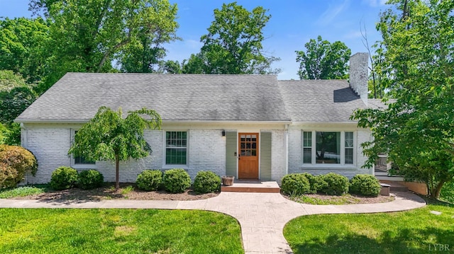3756 Woodside Ave, Lynchburg, VA 24503 - view of front facade with a chimney, a front lawn, roof with shingles, and brick siding