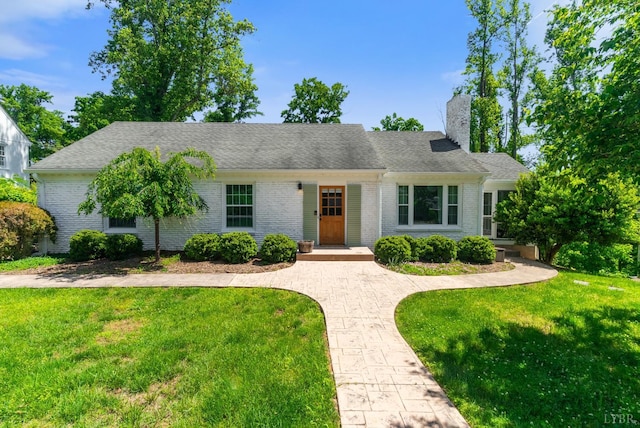 3756 Woodside Ave, Lynchburg, VA 24503 - view of front facade with brick siding, a front yard, a chimney, and a shingled roof