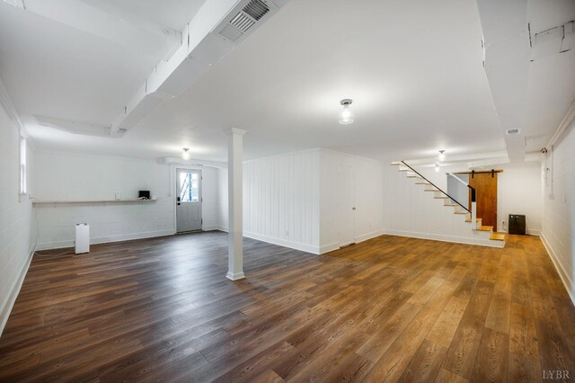 3756 Woodside Ave, Lynchburg, VA 24503 - basement featuring a barn door, wood-type flooring, baseboards, and stairs
