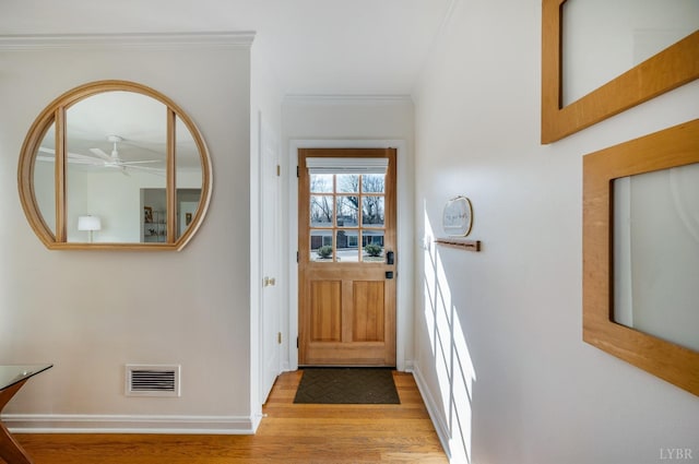 3756 Woodside Ave, Lynchburg, VA 24503 - entrance foyer featuring a ceiling fan, light wood-style floors, crown molding, and baseboards