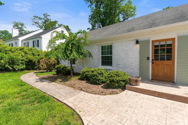 3756 Woodside Ave, Lynchburg, VA 24503 - entrance to property with a lawn and roof with shingles
