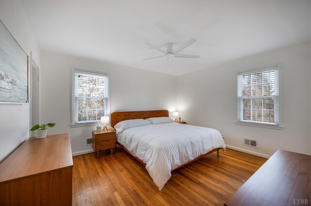 3756 Woodside Ave, Lynchburg, VA 24503 - bedroom featuring multiple windows, wood finished floors, and baseboards