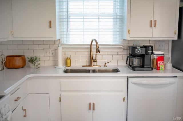 3756 Woodside Ave, Lynchburg, VA 24503 - kitchen featuring dishwasher, a sink, white cabinetry, light countertops, and tasteful backsplash