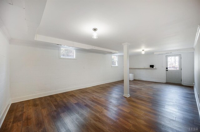 3756 Woodside Ave, Lynchburg, VA 24503 - below grade area with dark wood-style flooring, healthy amount of natural light, concrete block wall, and baseboards