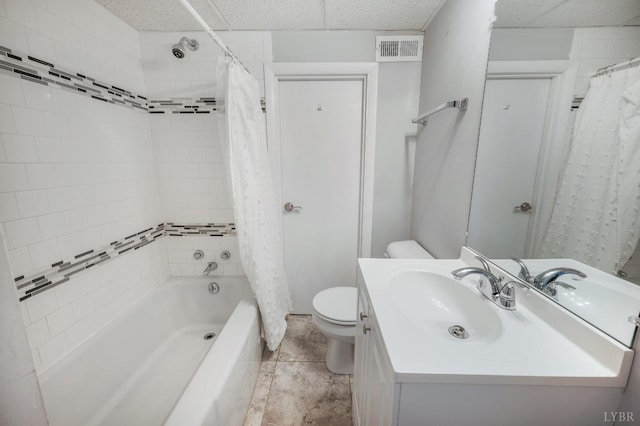 full bath featuring toilet, vanity, shower / tub combo, and visible vents