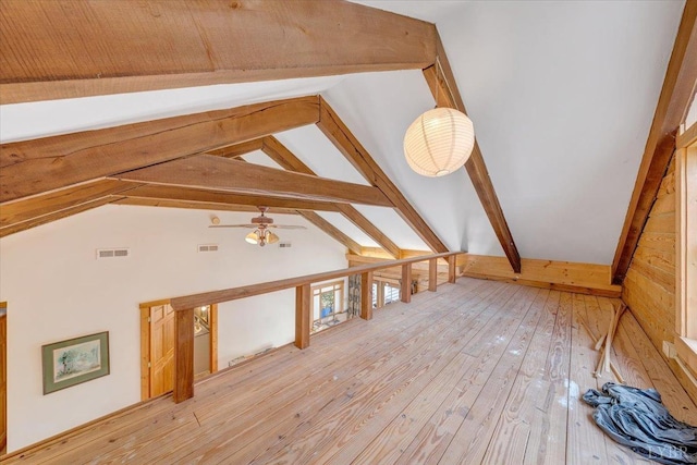 bonus room featuring light wood-style floors and a ceiling fan