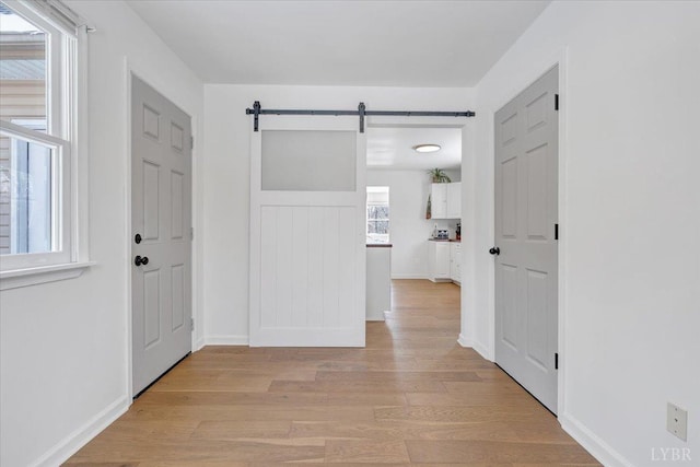 268 Leftwich Rd, Madison Heights, VA 24572 - entrance foyer with light wood finished floors and a barn door