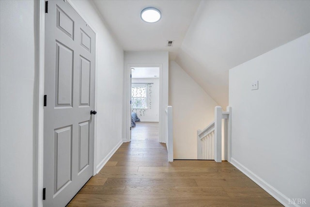 268 Leftwich Rd, Madison Heights, VA 24572 - hall featuring an upstairs landing, wood finished floors, and vaulted ceiling