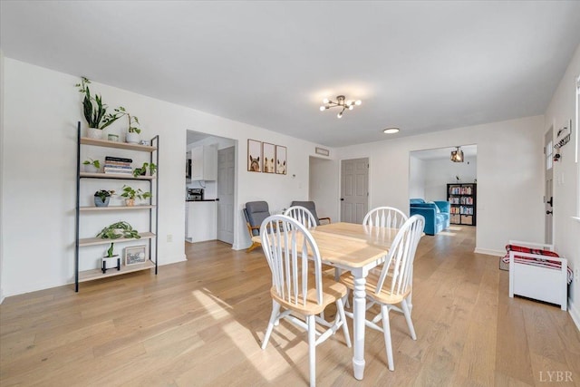 268 Leftwich Rd, Madison Heights, VA 24572 - dining space featuring light wood-style flooring and baseboards