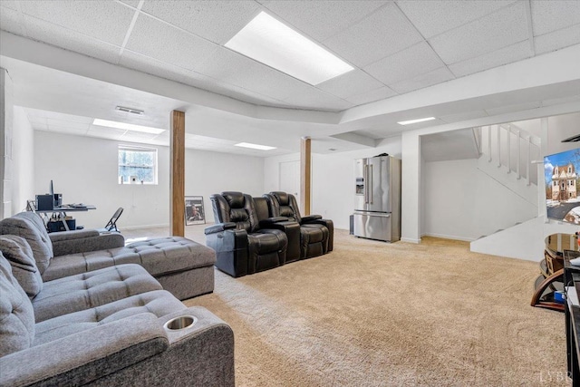 268 Leftwich Rd, Madison Heights, VA 24572 - living room featuring a drop ceiling, light carpet, and stairway