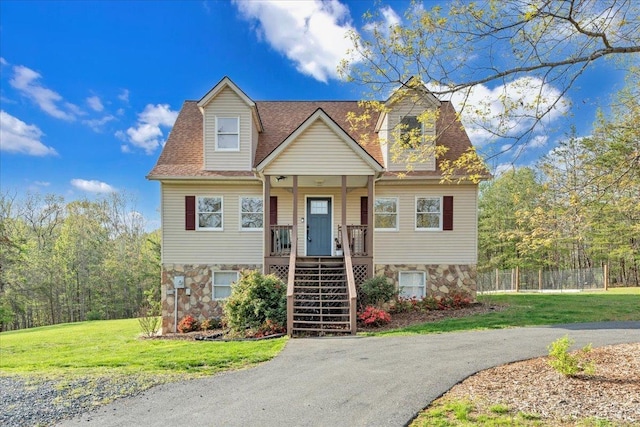 268 Leftwich Rd, Madison Heights, VA 24572 - cape cod-style house featuring stone siding, stairs, and covered porch