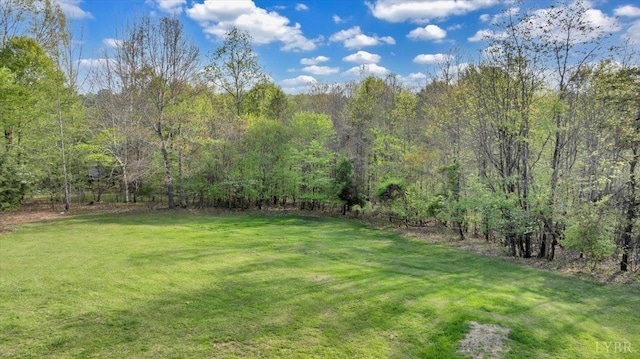 268 Leftwich Rd, Madison Heights, VA 24572 - view of green lawn with a wooded view