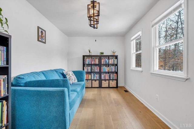 268 Leftwich Rd, Madison Heights, VA 24572 - sitting room featuring light wood finished floors, baseboards, and a chandelier