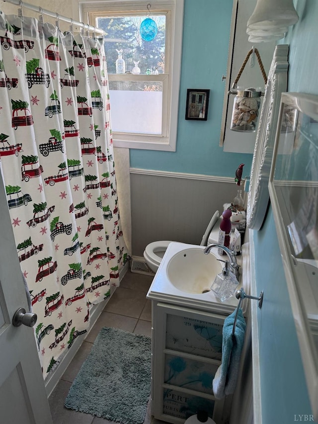 101 Mountain View Dr, Lynchburg, VA 24502 - bathroom with tile patterned flooring, a shower with shower curtain, vanity, and wainscoting