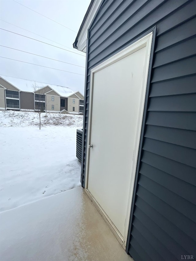 67 Warwick Dr, Lynchburg, VA 24501 - snow covered property entrance featuring central air condition unit