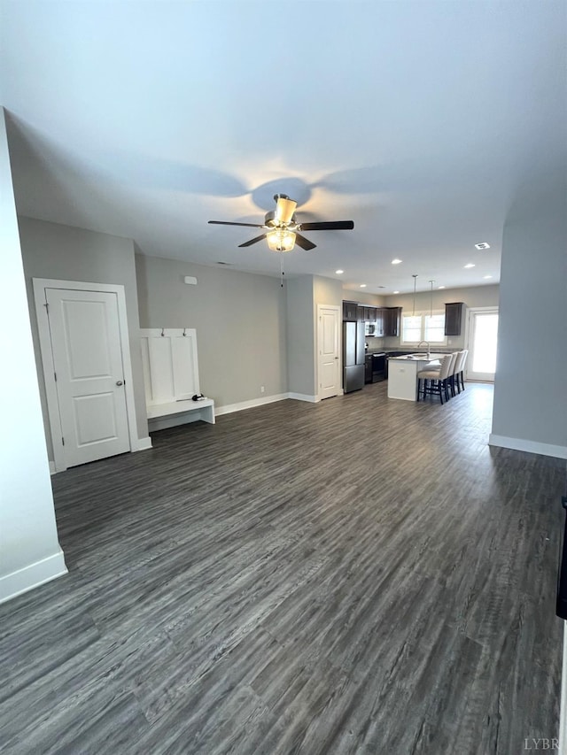 67 Warwick Dr, Lynchburg, VA 24501 - unfurnished living room featuring dark hardwood / wood-style flooring, sink, and ceiling fan