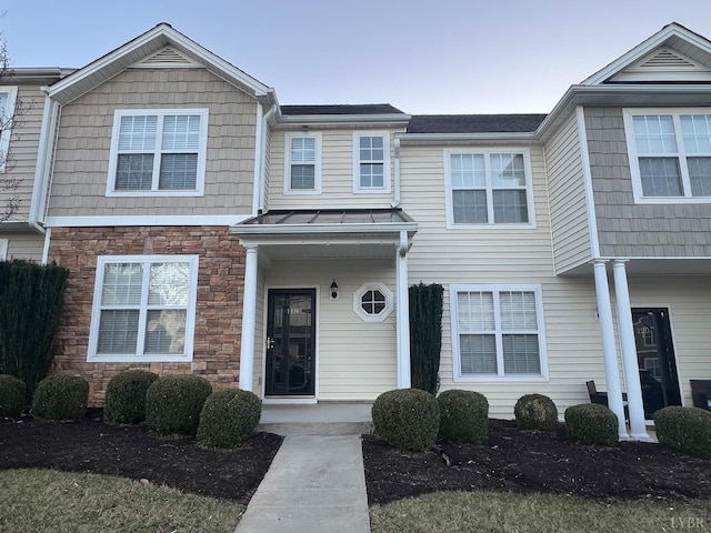 118 Logan Ln, Lynchburg, VA 24502 - view of property with stone siding and a standing seam roof