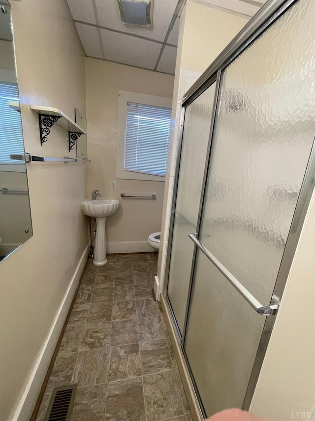 307 Stafford St, Lynchburg, VA 24501 - full bathroom featuring visible vents, toilet, baseboards, and a stall shower