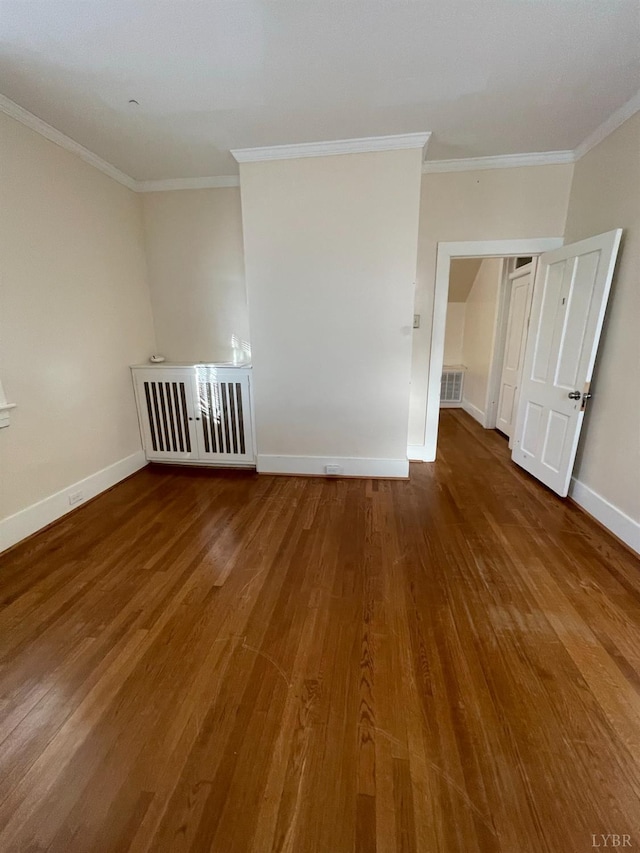 307 Stafford St, Lynchburg, VA 24501 - empty room with baseboards, crown molding, wood finished floors, and visible vents