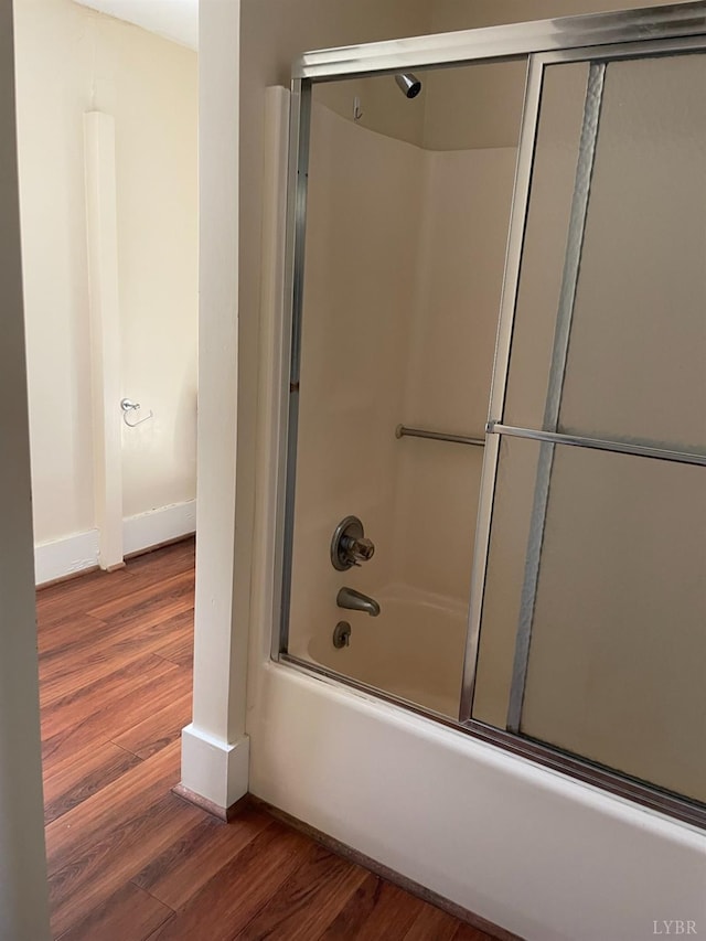 307 Stafford St, Lynchburg, VA 24501 - full bathroom with combined bath / shower with glass door, baseboards, and wood finished floors