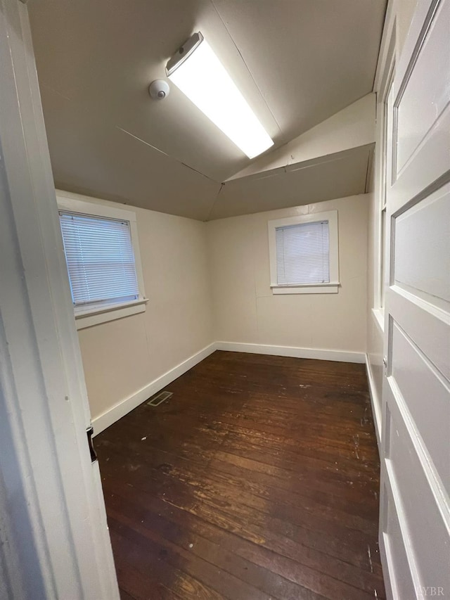 307 Stafford St, Lynchburg, VA 24501 - unfurnished room with vaulted ceiling, hardwood / wood-style floors, baseboards, and visible vents