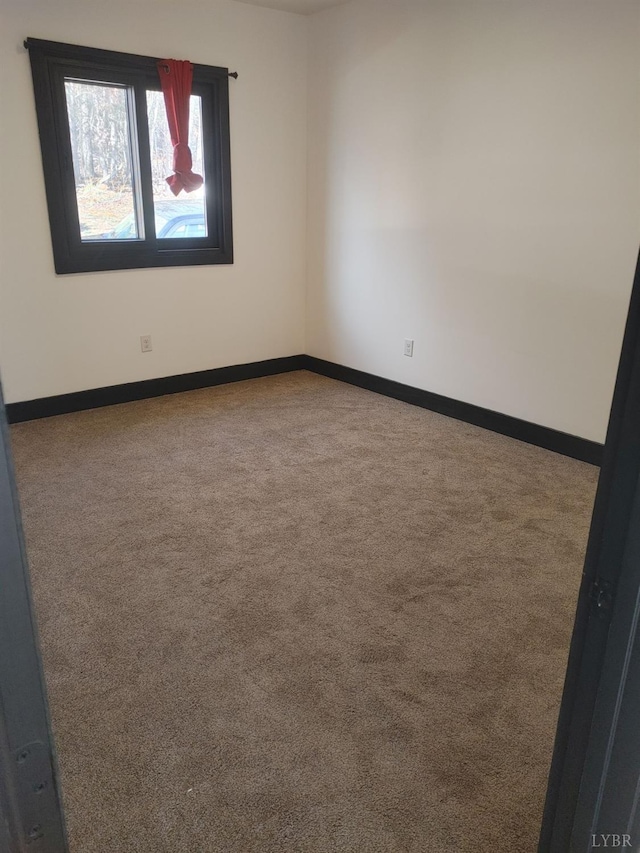 8915 Charlemont Rd, Goode, VA 24556 - carpeted spare room featuring baseboards