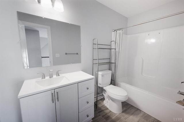 4802 Old Boonsboro Rd, Lynchburg, VA 24503 - bathroom with wood finished floors, toilet, vanity, and shower / bath combo with shower curtain