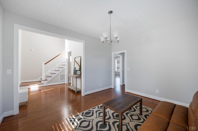 4802 Old Boonsboro Rd, Lynchburg, VA 24503 - living area with a chandelier, stairs, wood finished floors, and baseboards
