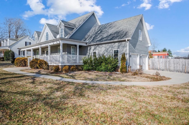 4802 Old Boonsboro Rd, Lynchburg, VA 24503 - view of side of home with covered porch, an attached garage, driveway, and roof with shingles