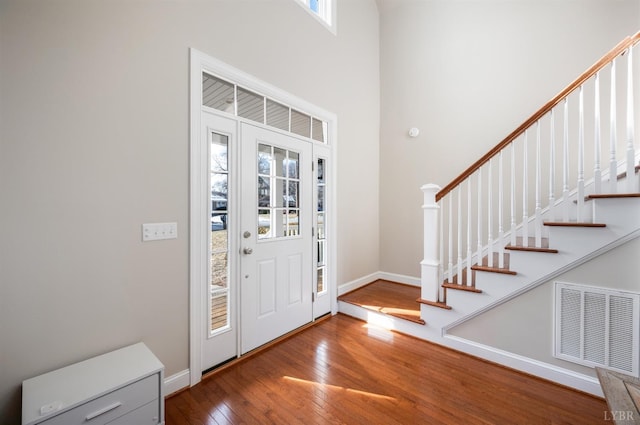 4802 Old Boonsboro Rd, Lynchburg, VA 24503 - entrance foyer featuring hardwood / wood-style flooring, baseboards, stairs, and a towering ceiling