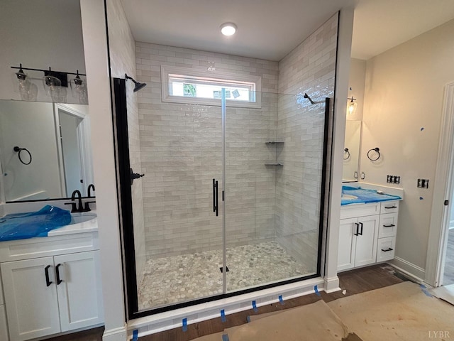 3 Live Oak Dr, Forest, VA 24551 - bathroom featuring vanity, a stall shower, and wood finished floors