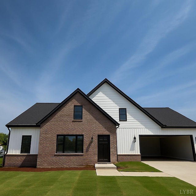 3 Live Oak Dr, Forest, VA 24551 - modern farmhouse style home with brick siding, a front lawn, driveway, board and batten siding, and an attached garage
