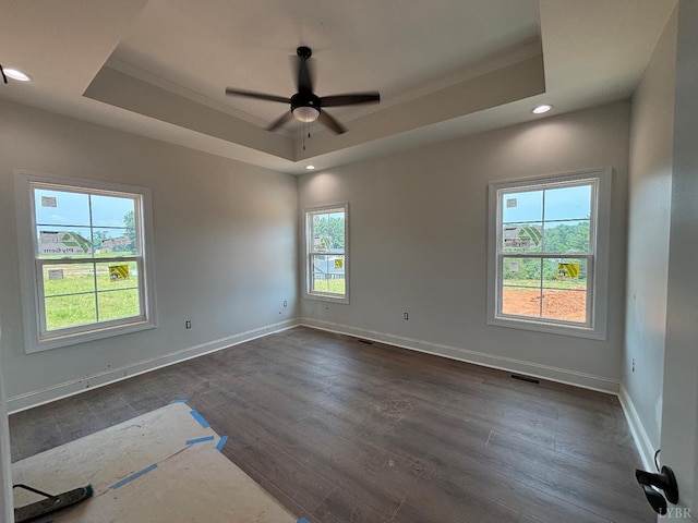 3 Live Oak Dr, Forest, VA 24551 - empty room with a tray ceiling, a ceiling fan, dark wood-type flooring, recessed lighting, and ornamental molding