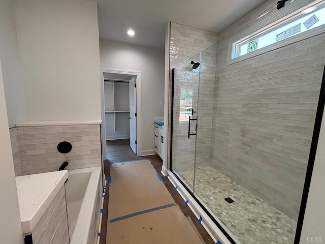 3 Live Oak Dr, Forest, VA 24551 - bathroom featuring a stall shower, vanity, a bath, recessed lighting, and a spacious closet