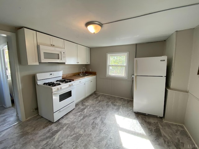 2278 Otey St, Lynchburg, VA 24501 - kitchen featuring white cabinets, white appliances, and a sink
