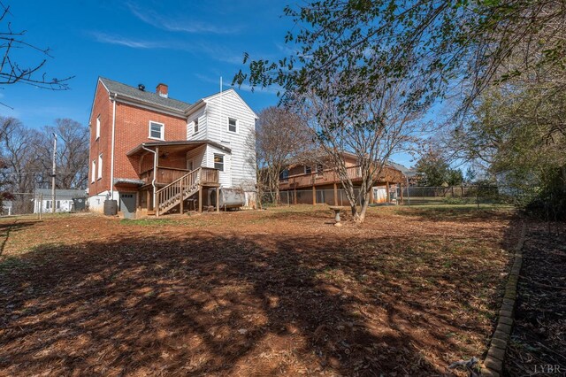 4610 Alabama Ave, Lynchburg, VA 24502 - back of property with stairway, fence, and a chimney