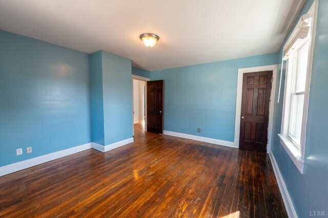 4610 Alabama Ave, Lynchburg, VA 24502 - empty room with baseboards and dark wood finished floors