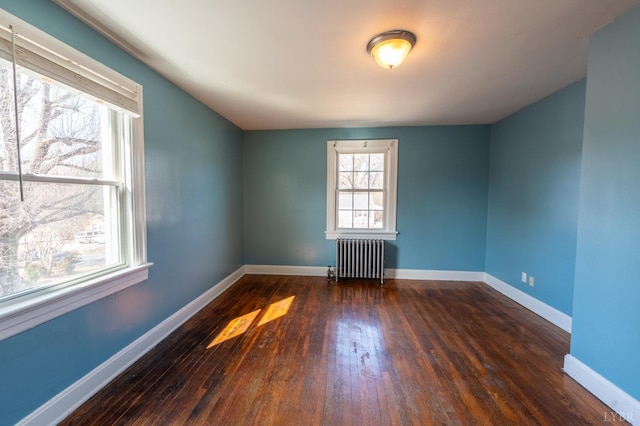 4610 Alabama Ave, Lynchburg, VA 24502 - unfurnished room with baseboards, radiator, and hardwood / wood-style floors