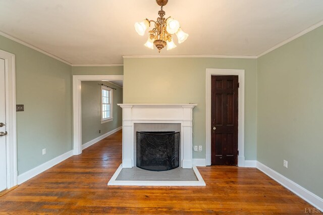 4610 Alabama Ave, Lynchburg, VA 24502 - unfurnished living room with crown molding, a notable chandelier, a fireplace with raised hearth, baseboards, and wood finished floors