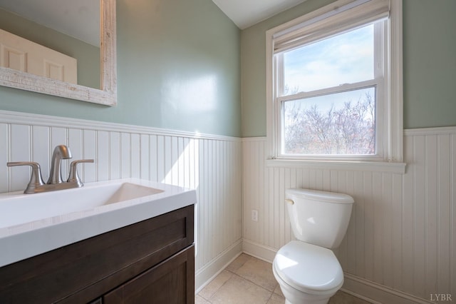 4610 Alabama Ave, Lynchburg, VA 24502 - bathroom with a wainscoted wall, vanity, toilet, and a wealth of natural light
