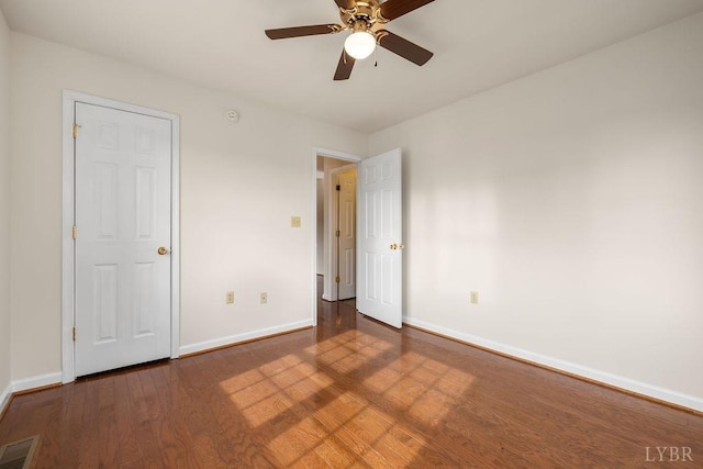 302 Pilot View Rd, Concord, VA 24538 - unfurnished bedroom with baseboards, wood finished floors, and a ceiling fan