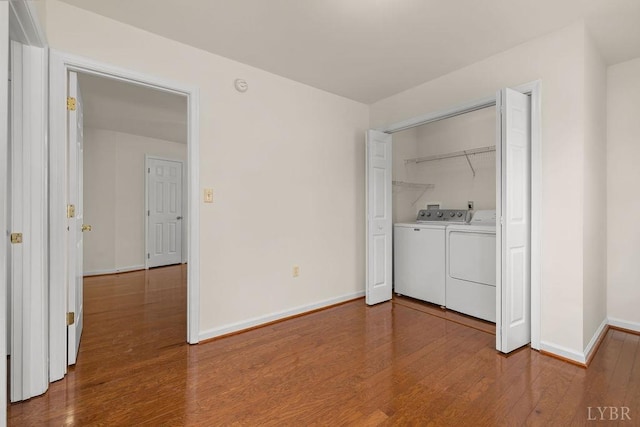 302 Pilot View Rd, Concord, VA 24538 - laundry room featuring independent washer and dryer, wood finished floors, and baseboards