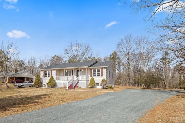 302 Pilot View Rd, Concord, VA 24538 - ranch-style house with covered porch, driveway, and a front lawn