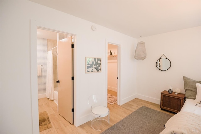1926 Canterbury Ct Unit 301, Lynchburg, VA 24503 - bedroom featuring baseboards, a walk in closet, light wood-style flooring, and a closet