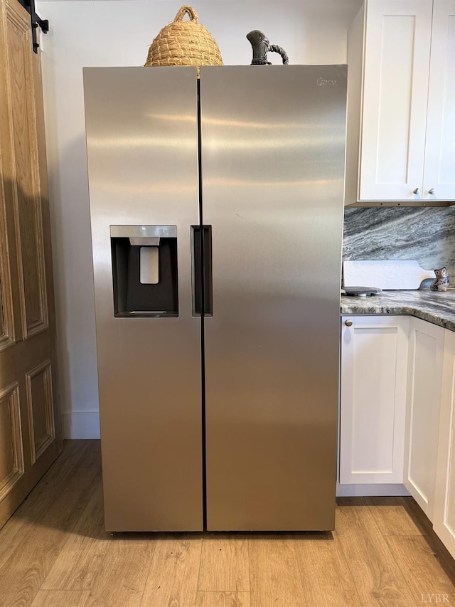 1926 Canterbury Ct Unit 301, Lynchburg, VA 24503 - kitchen with stainless steel refrigerator with ice dispenser, a barn door, white cabinets, stone countertops, and light wood finished floors