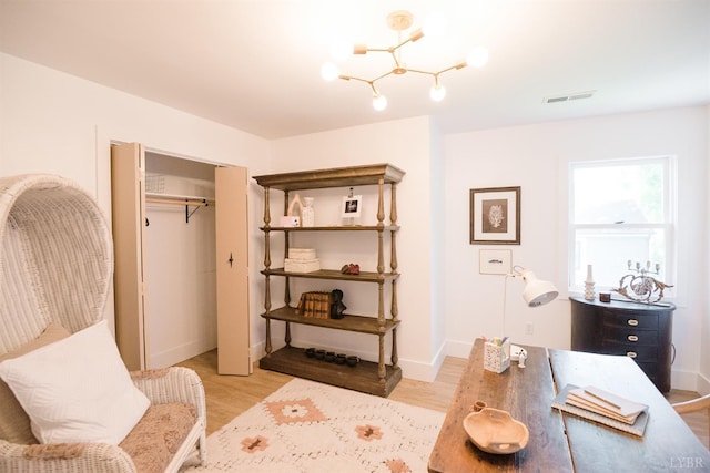1926 Canterbury Ct Unit 301, Lynchburg, VA 24503 - office with visible vents, baseboards, an inviting chandelier, and light wood-type flooring