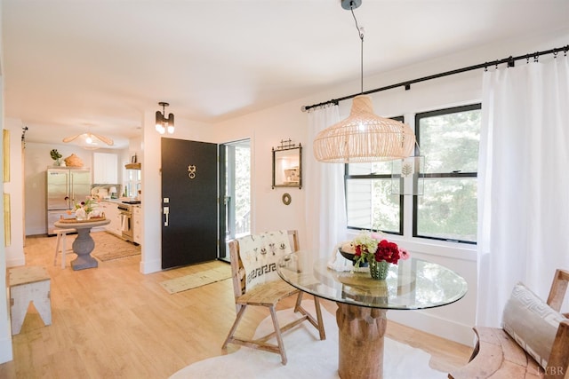 1926 Canterbury Ct Unit 301, Lynchburg, VA 24503 - dining area with baseboards and light wood finished floors