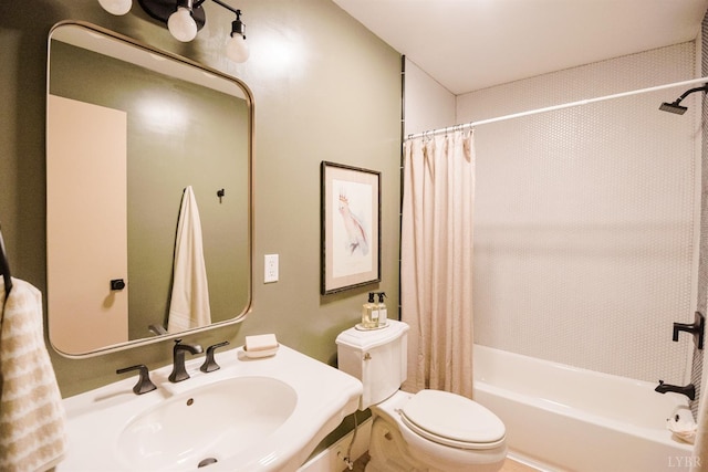 1926 Canterbury Ct Unit 301, Lynchburg, VA 24503 - bathroom featuring toilet, a sink, and shower / bath combo with shower curtain