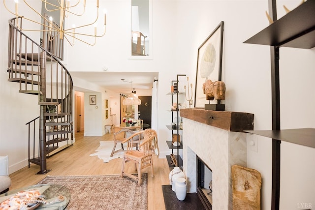 1926 Canterbury Ct Unit 301, Lynchburg, VA 24503 - entryway with a towering ceiling, wood finished floors, baseboards, an inviting chandelier, and stairs