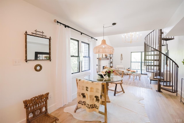 1926 Canterbury Ct Unit 301, Lynchburg, VA 24503 - dining space with stairway, baseboards, wood finished floors, and a notable chandelier